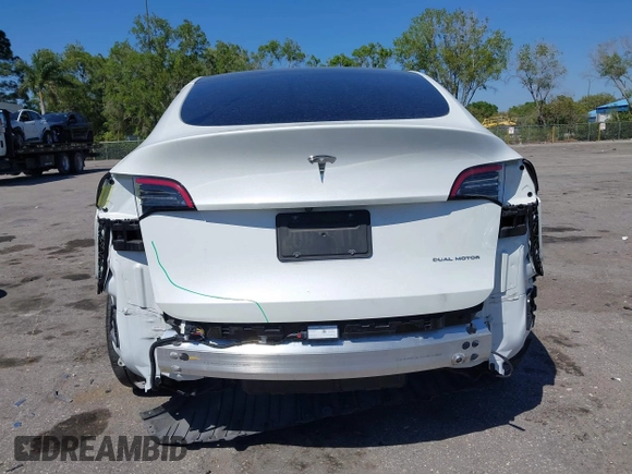 2022 Tesla Model Y Long Range with VIN 7SAYGAEE8NF431786, listed as a IAAI auction lot 41750353 with 67,846 mi miles and . Bid and sale history available at carsss.com. Image 17.