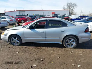 2004 Pontiac Grand Am SE1 with VIN 1G2NF52E54M646874, listed as a IAAI auction lot 41564072 with 97,437 mi miles. Bid and sale history available at carsss.com. Image 14.