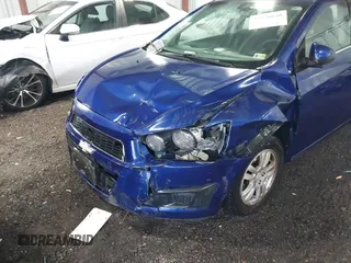 2014 Chevrolet Sonic LT with VIN 1G1JC5SG4E4136790, listed as a IAAI auction lot 37970640 with 180,252 mi miles and . Bid and sale history available at DreamBid. Image 6.