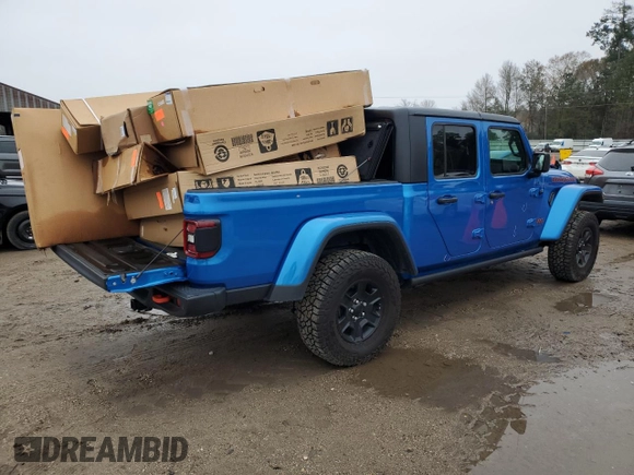 2023 Jeep Gladiator Mojave с VIN 1C6JJTEG7PL580727, выставлен на аукционе Copart как лот 89020825 с пробегом 12 707 миль миль и Списание • Salvage title. История ставок и продаж доступна на DreamBid. Изображение 3.