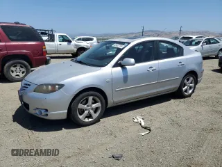 2006 Mazda 3 s z VIN JM1BK324261540232, wystawiony jako Copart lot #58432755 z przebiegiem 101 997 mil mil oraz Szkoda całkowita • Salvage title. Historia ofert i sprzedaży dostępna na DreamBid. Obrazek 1.