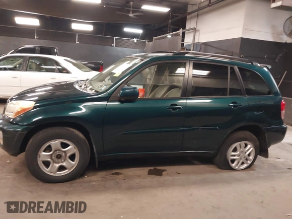 2003 Toyota RAV4 with VIN JTEGH20V130114281, listed as a IAAI auction lot 42144334 with 82,134 mi miles and . Bid and sale history available at carsss.com. Image 14.