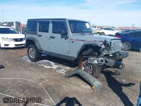 2015 Jeep Wrangler Unlimited Willys Wheeler with VIN 1C4BJWDG4FL589822, listed as a IAAI auction lot 41732614 with 149,112 mi miles and . Bid and sale history available at DreamBid. Image 1.