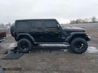 2020 Jeep Wrangler Unlimited North Edition with VIN 1C4HJXENXLW247525, listed as a IAAI auction lot 41481452 with 49,557 mi miles. Bid and sale history available at carsss.com. Image 13.