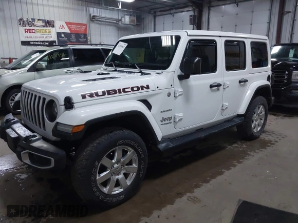 2018 Jeep Wrangler Unlimited Sahara z VIN 1C4HJXEG3JW117990, wystawiony jako IAAI lot #42290861 z przebiegiem 86 907 mil mil oraz . Historia ofert i sprzedaży dostępna na DreamBid. Obrazek 2.