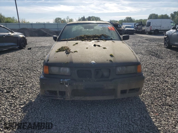 1998 BMW 3 Series 328iA with VIN WBACD4329WAV61738, listed as a Copart auction lot 68561744 with 0 mi miles and Salvage Title. Bid and sale history available at carsss.com. Image 5.