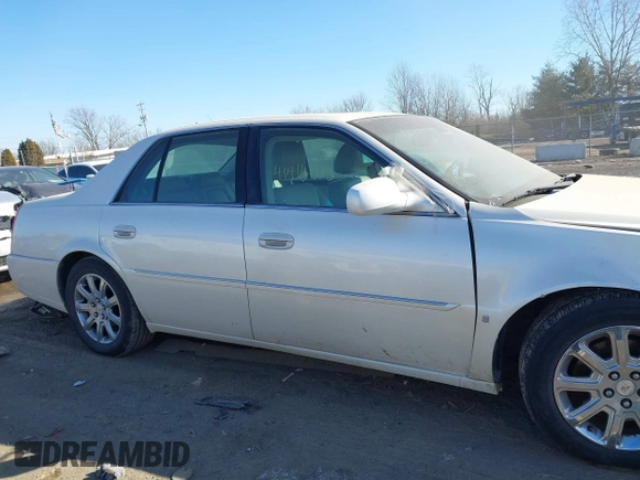 2008 Cadillac DTS 1SD z VIN 1G6KD57YX8U146211, wystawiony jako IAAI lot #41416406 z przebiegiem 141 362 mil mil oraz . Historia ofert i sprzedaży dostępna na DreamBid. Obrazek 13.