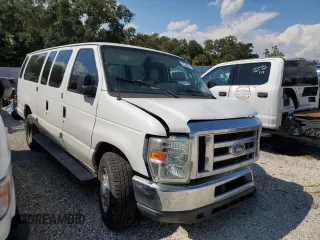 2009 Ford Econoline Passenger XL with VIN 1FBSS31L99DA06824, listed as a Copart auction lot 73740824 with 147,528 mi miles and Salvage title. Bid and sale history available at DreamBid. Image 4.
