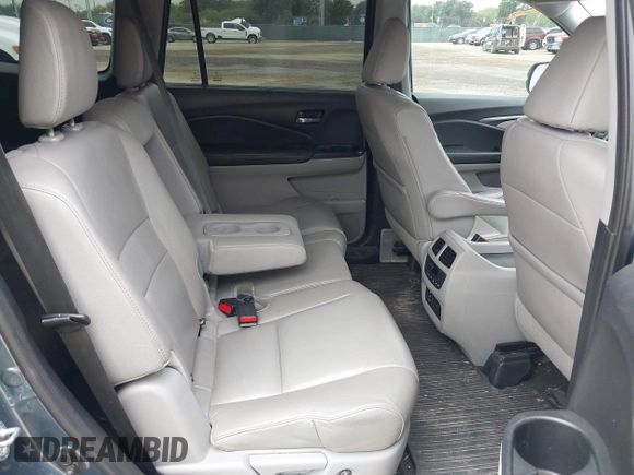 2017 Honda Pilot EX-L with VIN 5FNYF5H88HB042003, listed as a IAAI auction lot 42296542 with 172,823 mi miles and . Bid and sale history available at DreamBid. Image 8.