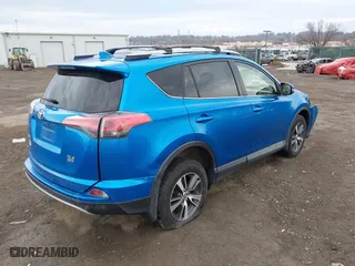 2017 Toyota RAV4 XLE with VIN JTMRFREV8HJ117393, listed as a IAAI auction lot 41676036 with 176,027 mi miles. Bid and sale history available at carsss.com. Image 4.