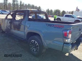 2023 Toyota Tacoma SR z VIN 3TYCZ5AN2PT132764, wystawiony jako IAAI lot #41832334 z przebiegiem 200 000 mil mil oraz . Historia ofert i sprzedaży dostępna na DreamBid. Obrazek 15.