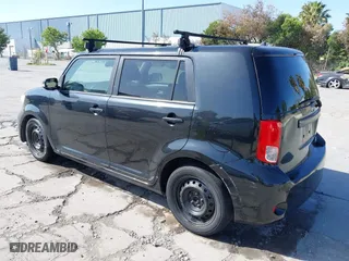 2012 Scion xB with VIN JTLZE4FE4C1143412, listed as a IAAI auction lot 42091929 with 213,501 mi miles. Bid and sale history available at carsss.com. Image 3.