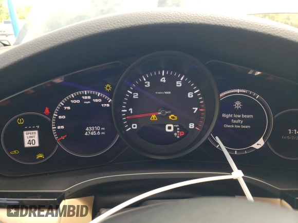 2022 Porsche Cayenne z VIN WP1AA2AY0NDA04856, wystawiony jako Copart lot #55302755 z przebiegiem 43 310 mil mil oraz Szkoda całkowita • Salvage title. Historia ofert i sprzedaży dostępna na DreamBid. Obrazek 9.