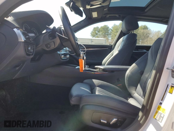 2019 BMW 5 Series 530e xDrive with VIN WBAJB1C5XKB377094, listed as a Copart auction lot 49153035 with 53,370 mi miles and Clean title. Bid and sale history available at DreamBid. Image 7.