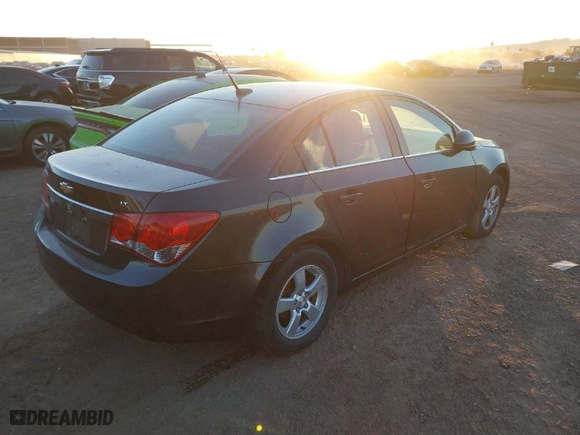2014 Chevrolet Cruze 1LT with VIN 1G1PC5SB6E7379725, listed as a IAAI auction lot 41637164 with 143,809 mi miles. Bid and sale history available at carsss.com. Image 4.