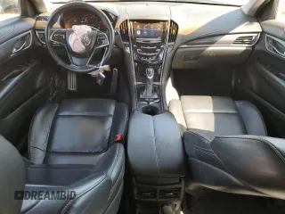 2013 Cadillac ATS z VIN 1G6AA5RAXD0155352, wystawiony jako Copart lot #52454965 z przebiegiem 105 571 mil mil oraz Szkoda całkowita • Salvage title. Historia ofert i sprzedaży dostępna na DreamBid. Obrazek 8.