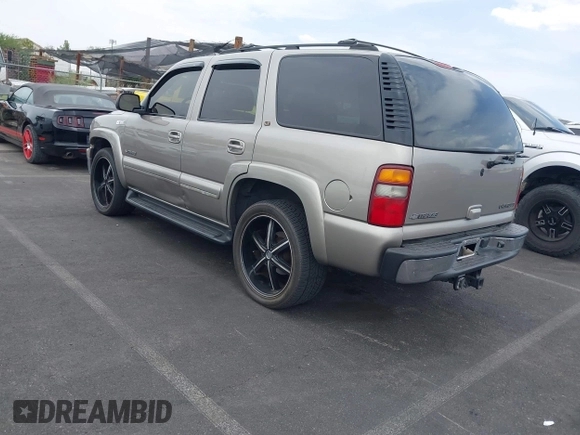 2002 Chevrolet Tahoe LS with VIN 1GNEC13ZX2J265803, listed as a IAAI auction lot 42571325 with 265,954 mi miles and . Bid and sale history available at DreamBid. Image 3.