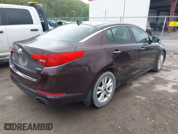2011 Kia Optima EX with VIN KNAGN4A69B5148919, listed as a IAAI auction lot 42133805 with 112,114 mi miles and . Bid and sale history available at carsss.com. Image 4.