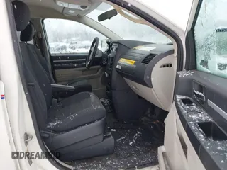 2009 Dodge Grand Caravan with VIN 2D8HN11E19R703857, listed as a IAAI auction lot 41195565 with 199,776 mi miles and . Bid and sale history available at DreamBid. Image 5.
