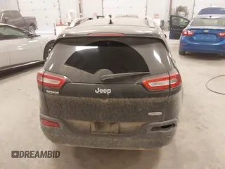 2015 Jeep Cherokee Latitude with VIN 1C4PJLCS8FW689849, listed as a IAAI auction lot 42144161 with 138,740 mi miles and . Bid and sale history available at carsss.com. Image 16.