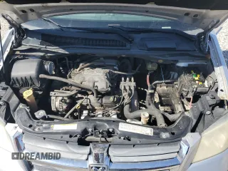 2010 Dodge Grand Caravan SXT with VIN 2D4RN5D17AR307328, listed as a Copart auction lot 49983425 with Not Provided miles and Clean Title. Bid and sale history available at DreamBid. Image 12.