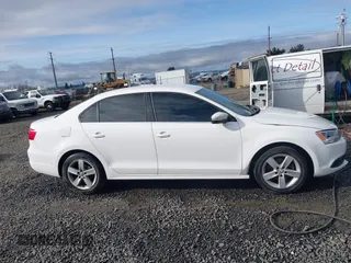 2013 Volkswagen Jetta TDI w/Premium with VIN 3VWLL7AJ2DM425448, listed as a IAAI auction lot 41806552 with 125,043 mi miles and . Bid and sale history available at DreamBid. Image 13.