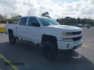 2016 Chevrolet Silverado 1500 LT with VIN 3GCUKREC3GG116107, listed as a IAAI auction lot 41490638 with 93,669 mi miles and . Bid and sale history available at DreamBid. Image 1.