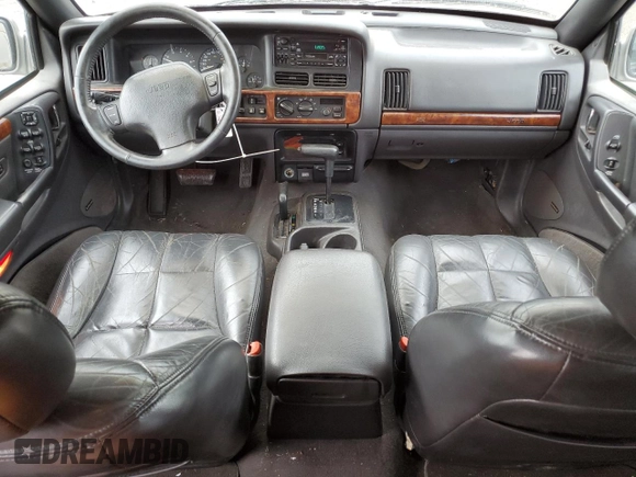 1997 Jeep Grand Cherokee Limited with VIN 1J4GZ78Y0VC682949, listed as a Copart auction lot 82152424 with 194,576 mi miles and Salvage Title. Bid and sale history available at carsss.com. Image 8.