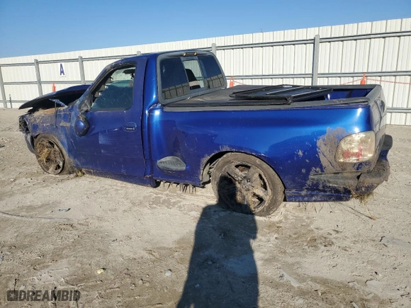 2004 Ford F-150 Heritage Lightning with VIN 2FTRF07394CA62825, listed as a Copart auction lot 45794935 with 117,044 mi miles and Salvage Title. Bid and sale history available at carsss.com. Image 2.
