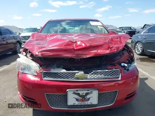 2014 Chevrolet Impala LT with VIN 2G1WB5E38E1132304, listed as a IAAI auction lot 42072869 with 128,579 mi miles and . Bid and sale history available at DreamBid. Image 12.