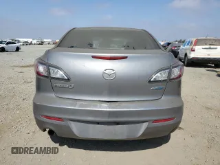 2012 Mazda 3 i Touring with VIN JM1BL1V86C1557191, listed as a Copart auction lot 63002985 with 218,863 mi miles and Clean title. Bid and sale history available at DreamBid. Image 6.
