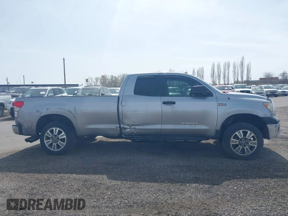 2012 Toyota Tundra 4WD Truck SR with VIN 5TFCW5F19CX012832, listed as a IAAI auction lot 41726453 with 232,078 mi miles. Bid and sale history available at carsss.com. Image 13.