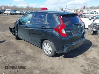 2015 Honda Fit LX z VIN 3HGGK5H51FM775176, wystawiony jako IAAI lot #41690648 z przebiegiem 49 979 mil mil oraz . Historia ofert i sprzedaży dostępna na DreamBid. Obrazek 3.