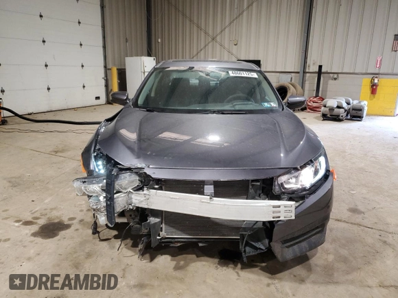 2018 Honda Civic EX with VIN 19XFC2F75JE005057, listed as a Copart auction lot 48601125 with 84,100 mi miles and Salvage Title. Bid and sale history available at DreamBid. Image 5.
