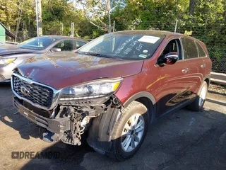 2019 Kia Sorento LX z VIN 5XYPG4A56KG481297, wystawiony jako IAAI lot #41994392 z przebiegiem 147 688 mil mil oraz . Historia ofert i sprzedaży dostępna na DreamBid. Obrazek 2.