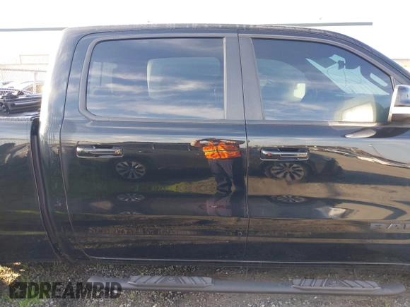 2022 Ram 1500 Big Horn with VIN 1C6RREMT1NN383138, listed as a IAAI auction lot 41576458 with 116,842 mi miles. Bid and sale history available at carsss.com. Image 14.