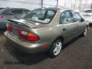 1998 Mazda Protege DX with VIN JM1BC141XW0200689, listed as a IAAI auction lot 41540162 with 172,311 mi miles and . Bid and sale history available at DreamBid. Image 4.