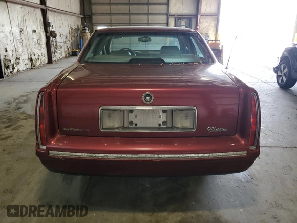 1998 Cadillac DeVille z VIN 1G6KD54Y3WU754718, wystawiony jako Copart lot #60068175 z przebiegiem 64 498 mil mil oraz Czysty tytuł • Clean title. Historia ofert i sprzedaży dostępna na DreamBid. Obrazek 6.