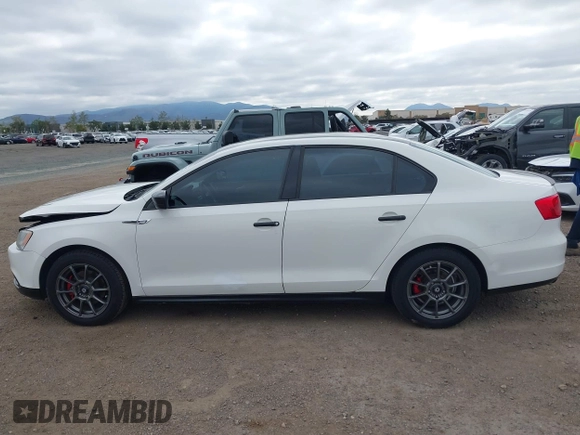 2014 Volkswagen Jetta S with VIN 3VW2K7AJ6EM233000, listed as a IAAI auction lot 41895391 with 130,692 mi miles and . Bid and sale history available at DreamBid. Image 14.