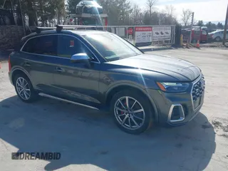 2023 Audi SQ5 Premium Plus z VIN WA1B4AFY8P2039475, wystawiony jako IAAI lot #41792138 z przebiegiem 35 334 mil mil oraz . Historia ofert i sprzedaży dostępna na DreamBid. Obrazek 1.
