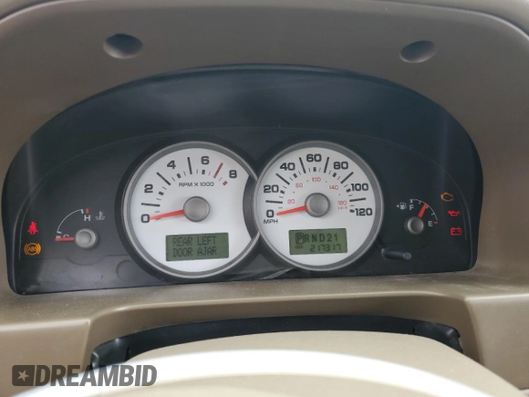 2005 Ford Escape Limited with VIN 1FMYU04165KA33277, listed as a Copart auction lot 54407625 with 217,317 mi miles and Salvage title. Bid and sale history available at DreamBid. Image 9.