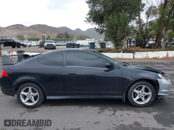 2003 Acura RSX with VIN JH4DC54853C017397, listed as a IAAI auction lot 42179973 with 219,490 mi miles. Bid and sale history available at carsss.com. Image 13.