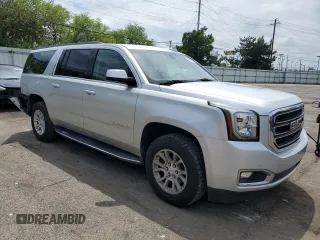 2019 GMC Yukon XL SLT z VIN 1GKS1GKC8KR245444, wystawiony jako Copart lot #55600905 z przebiegiem 106 345 mil mil oraz Szkoda całkowita • Salvage title. Historia ofert i sprzedaży dostępna na DreamBid. Obrazek 4.