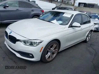 2017 BMW 3 Series 320i with VIN WBA8E1G33HNU17182, listed as a IAAI auction lot 41906604 with 59,166 mi miles. Bid and sale history available at carsss.com. Image 2.