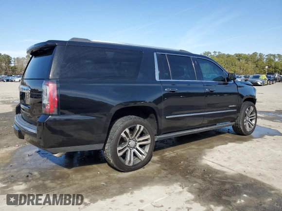 2019 GMC Yukon XL Denali with VIN 1GKS2HKJ9KR264134, listed as a Copart auction lot 43138545 with 105,690 mi miles and Salvage Title. Bid and sale history available at DreamBid. Image 3.