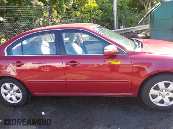 2009 Kia Optima LX z VIN KNAGE228395367017, wystawiony jako IAAI lot #42310556 z przebiegiem 234 760 mil mil oraz . Historia ofert i sprzedaży dostępna na DreamBid. Obrazek 13.