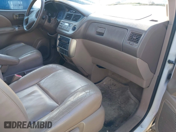 2001 Toyota Sienna LE with VIN 4T3ZF13C21U369974, listed as a IAAI auction lot 41821093 with 208,354 mi miles. Bid and sale history available at carsss.com. Image 5.