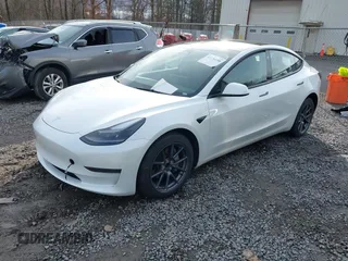 2023 Tesla Model 3 z VIN 5YJ3E1EAXPF543227, wystawiony jako IAAI lot #41150158 z przebiegiem 19 782 mil mil oraz . Historia ofert i sprzedaży dostępna na DreamBid. Obrazek 17.