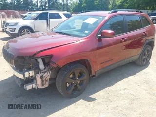 2019 Jeep Cherokee Latitude Plus with VIN 1C4PJLLBXKD339435, listed as a IAAI auction lot 42224535 with 104,276 mi miles and . Bid and sale history available at DreamBid. Image 2.