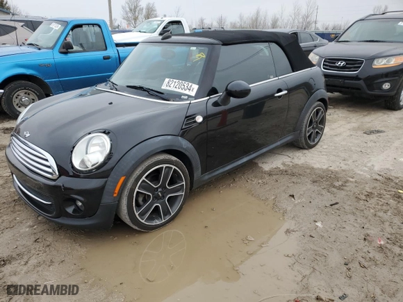 2012 MINI Cooper Convertible with VIN WMWZN3C51CT265589, listed as a Copart auction lot 82120534 with 83,604 mi miles and Clean Title. Bid and sale history available at carsss.com. Image 1.